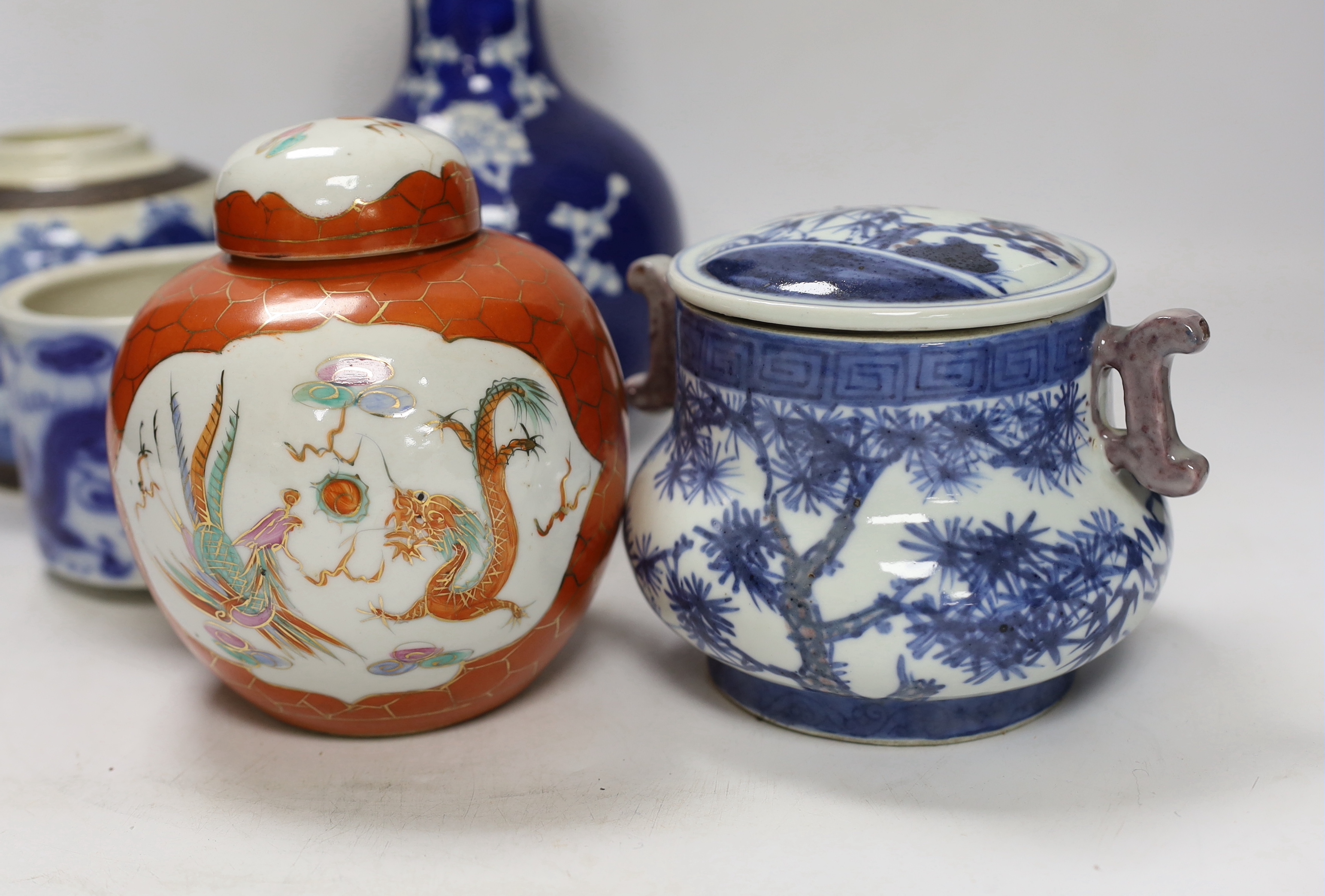 Two Chinese famille rose jars, a similar pot with cover, a brush pot and a vase, 18th century and later, tallest 24cm (5)